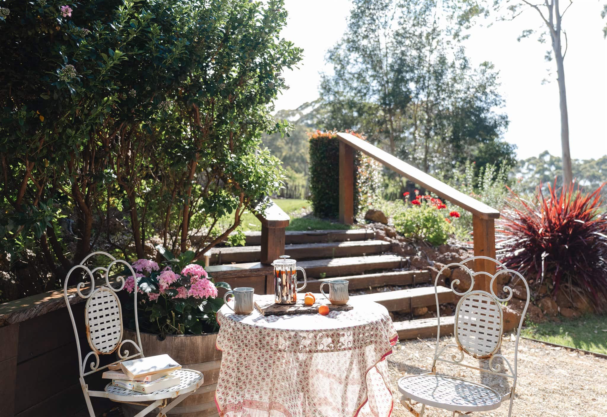 Your own manicured gardens amongst the tall trees