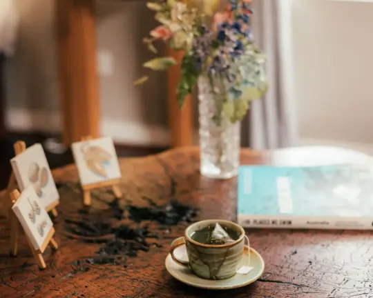 Cup with a tea bag on a table